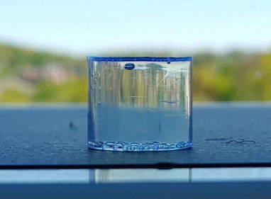 Tin-loaded Organic Glass Scintillator